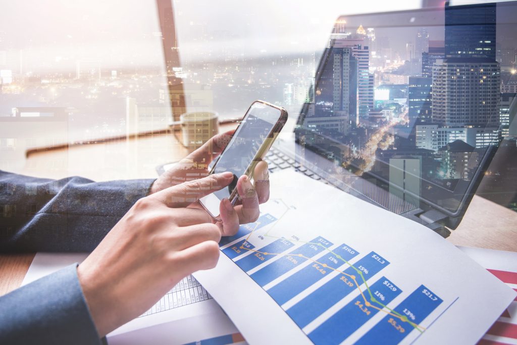 double exposure of businessman using smartphone or cellphone to connect with other people with blur city night background, network business connection concept.